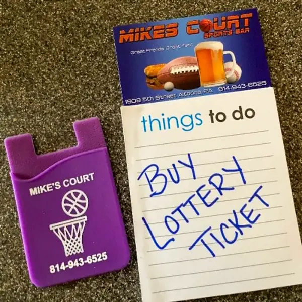 Mike's Court credit card holder and note pad that says play lottery