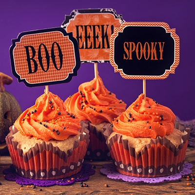Halloween cupcakes with orange frosting.