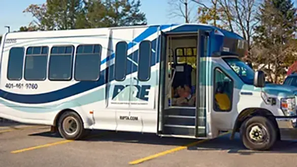 RIPTA bus at Ocean State Job Lot’s Three Square Meals program donation event along with iHeartRadio in Johnston, Rhode Island in November 2022.