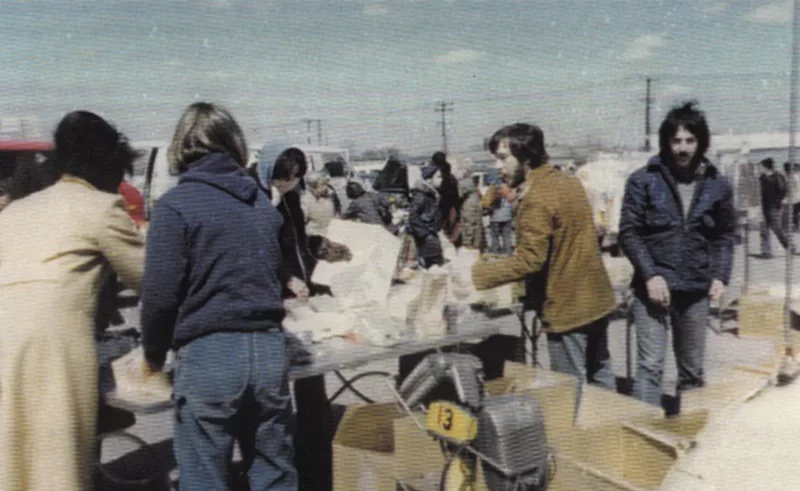 The owners of Ocean State Job Lot at a flea market in New York in the early years of OSJL