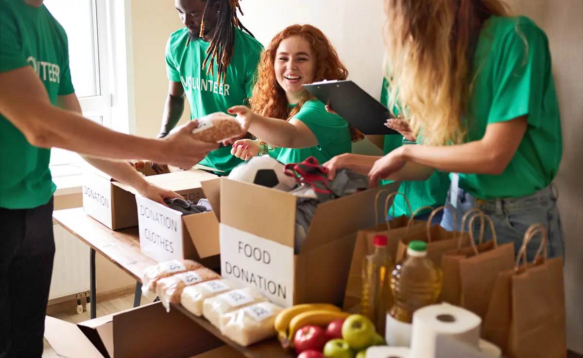 Volunteers accepting donations at a local food bank.