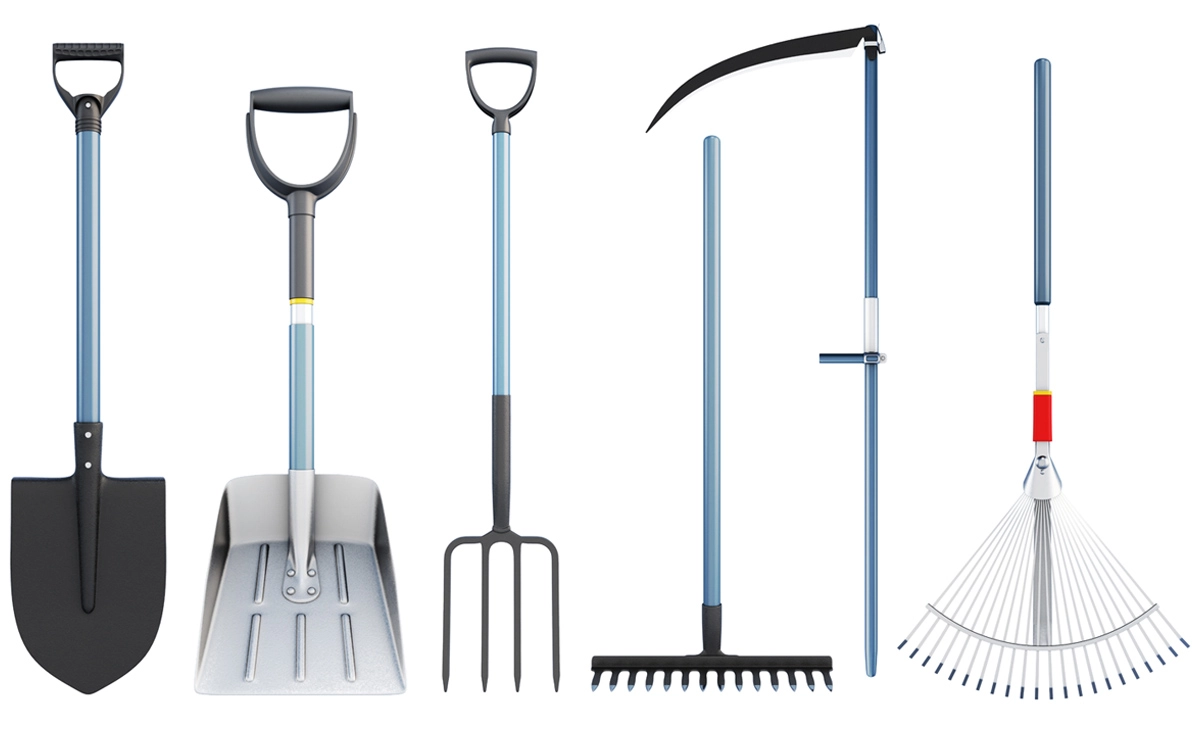 An assortment of large garden tools.