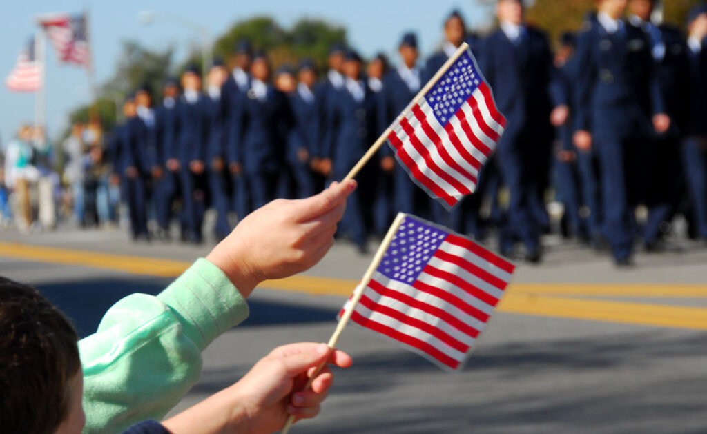 Flag waving at a Memorial Day parade.