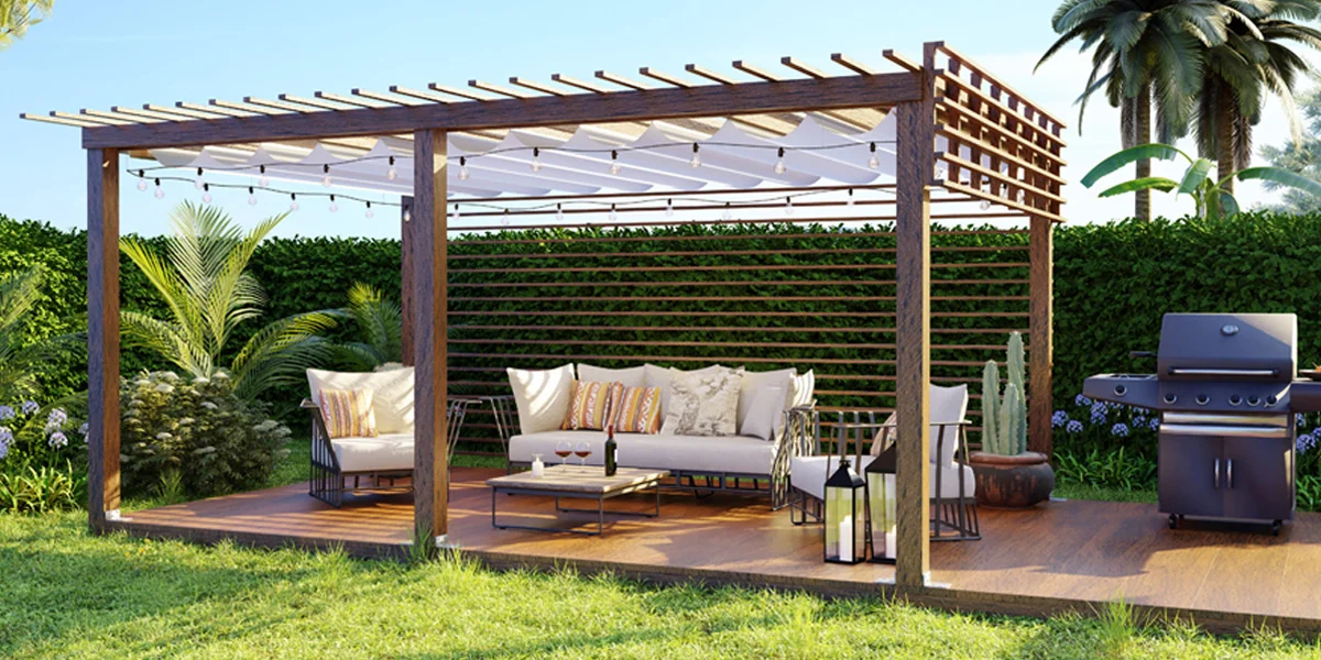 Outdoor furniture including a gazebo and grill outdoors in the backyard.