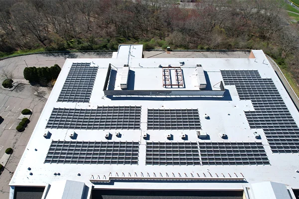 Aerial view of solar panels on a rooftop.