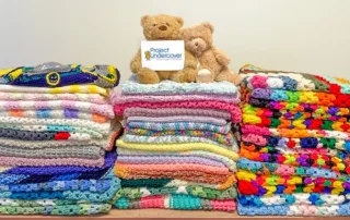 Thousands of skeins of yarn were donated by OSJL’s Charitable Foundation to help children in need.