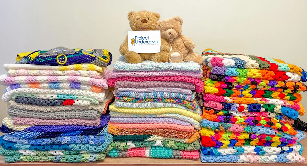 Thousands of skeins of yarn were donated by OSJL’s Charitable Foundation to help children in need.