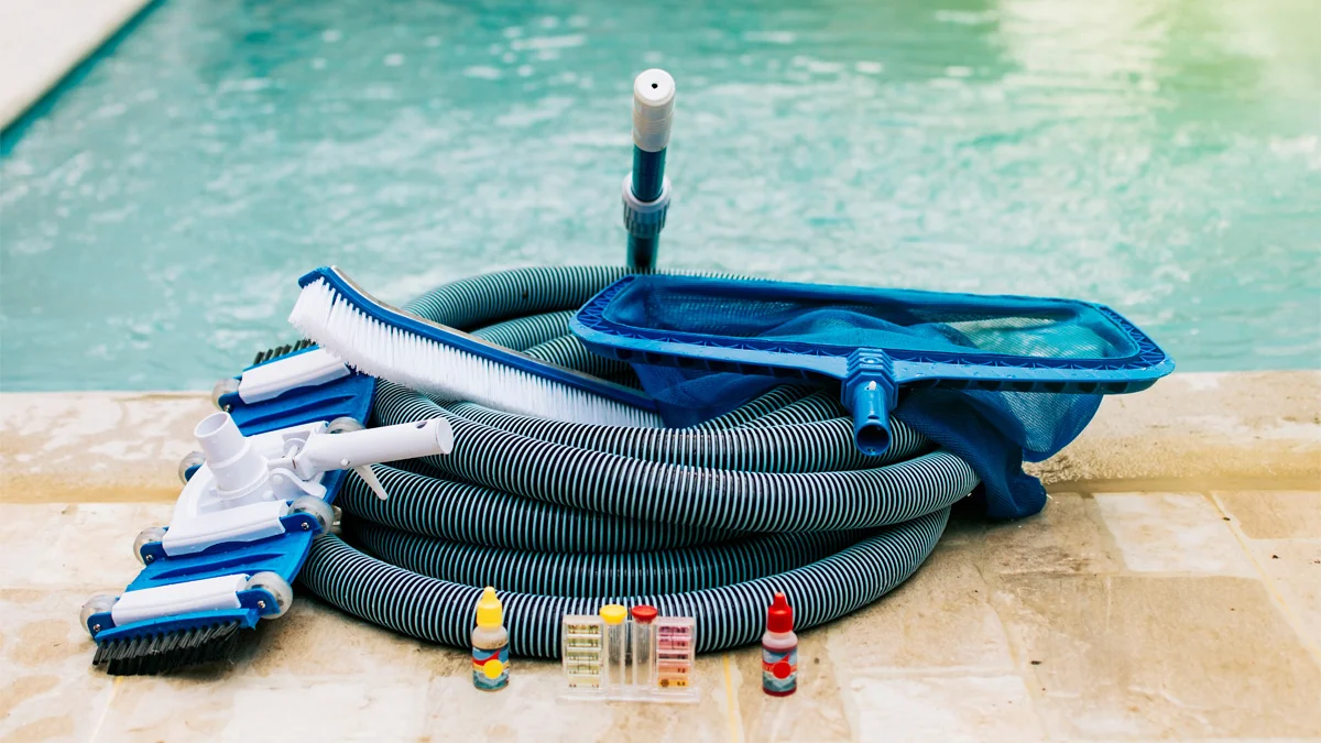 Pool cleaning and closing supplies including chemicals, maintenance kit, hoses, vacuum cleaner and leaf skimmer.