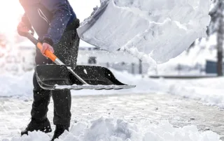 a person shoveling snow