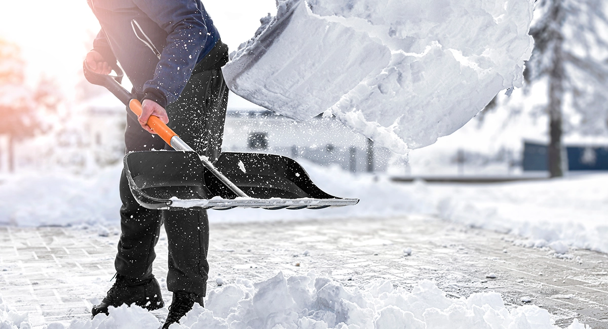 a person shoveling snow