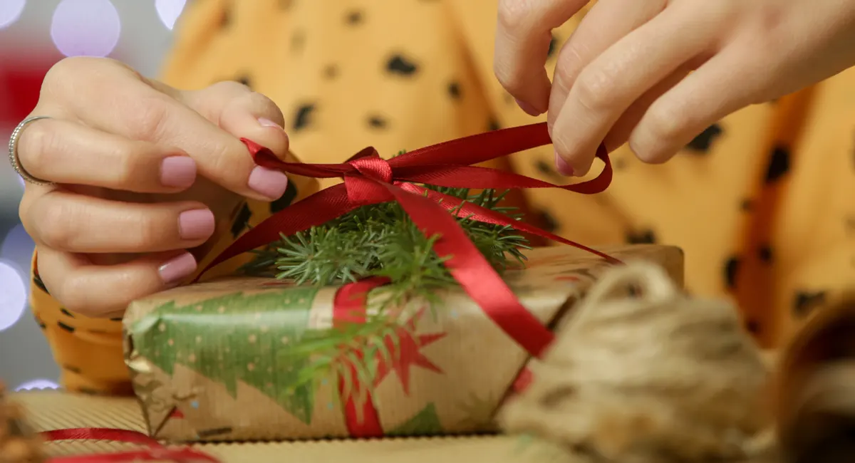 Adding a special ribbon on a Christmas gift