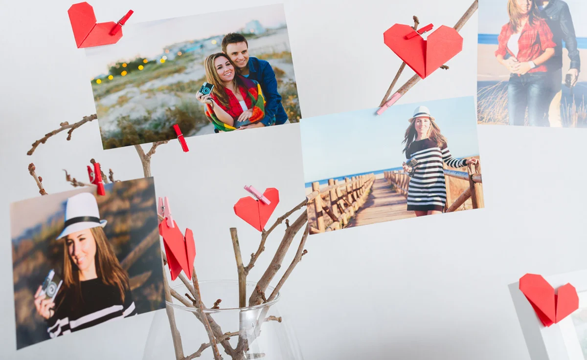 Vase and branches with sentimental pictures and origami hearts