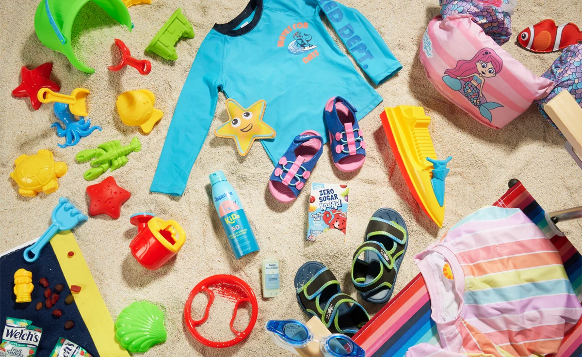 Kids sunware, hat and sunscreen for a fun day at the beach.