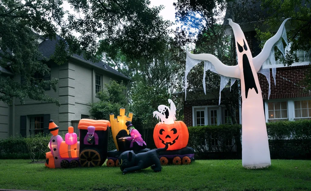 A festive yard full of fun Halloween inflatables