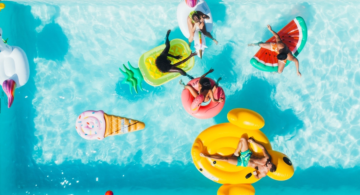 Enjoying some time in the pool with friends. Enjoying some time in the pool with friends.