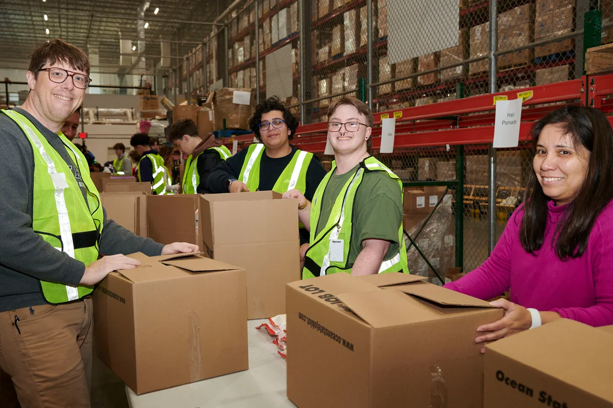 Volunteers pack Operation Sleep Well Kits.