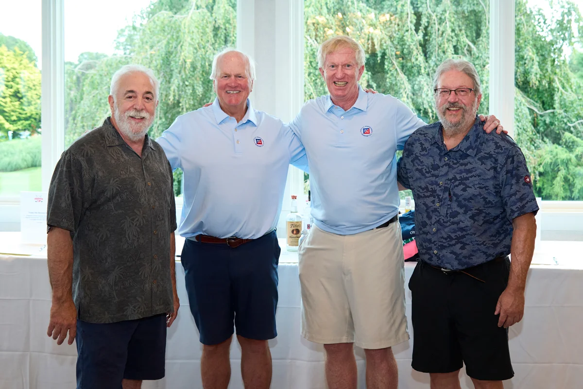 Ocean State Job Lot owners Marc and Alan Perlman with vendors at the 22nd annual Ocean State Job Lot Tournament.