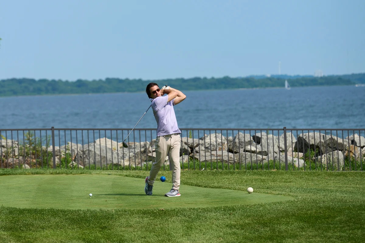 Ocean State Job Lot Director of Strategy Ben Perlman teeing off at the 22nd annual Ocean State Job Lot Golf Tournament.